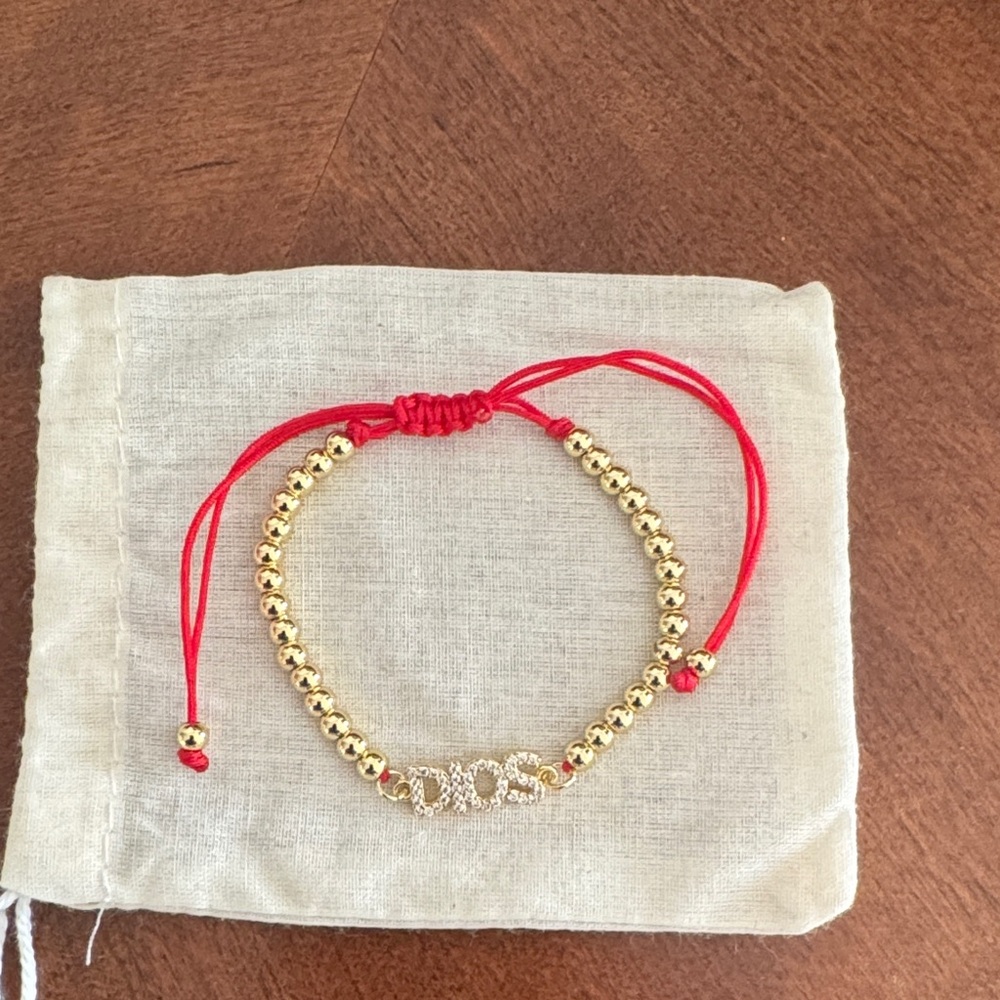 Christian bracelet with the words DIOS meaning GOD. New